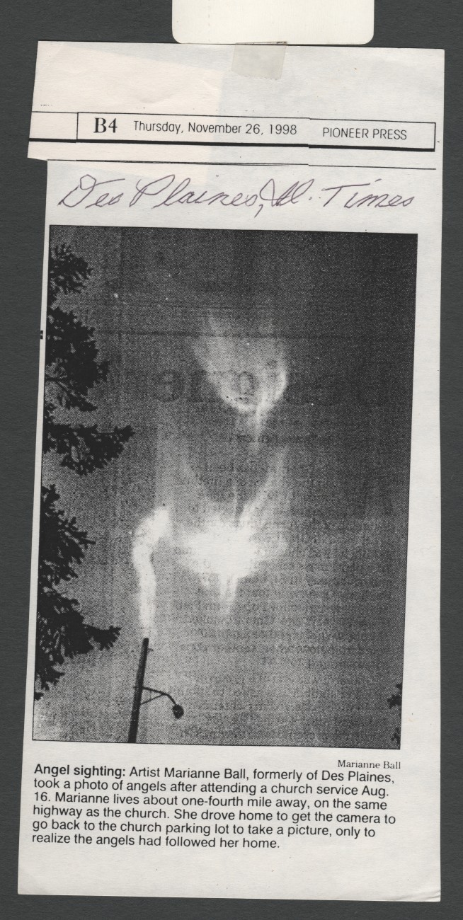 Newspaper clipping from the Pioneer Press dated Thursday, November 26, 1998, captioned Angel sighting, showing the same photograph.